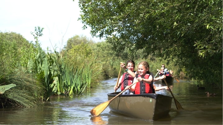 WWT people in a canoe